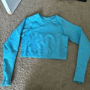 Alphalete baby blue long sleeve compression crop top revival